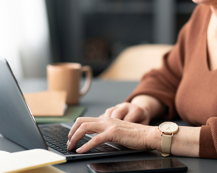 senior woman using laptop