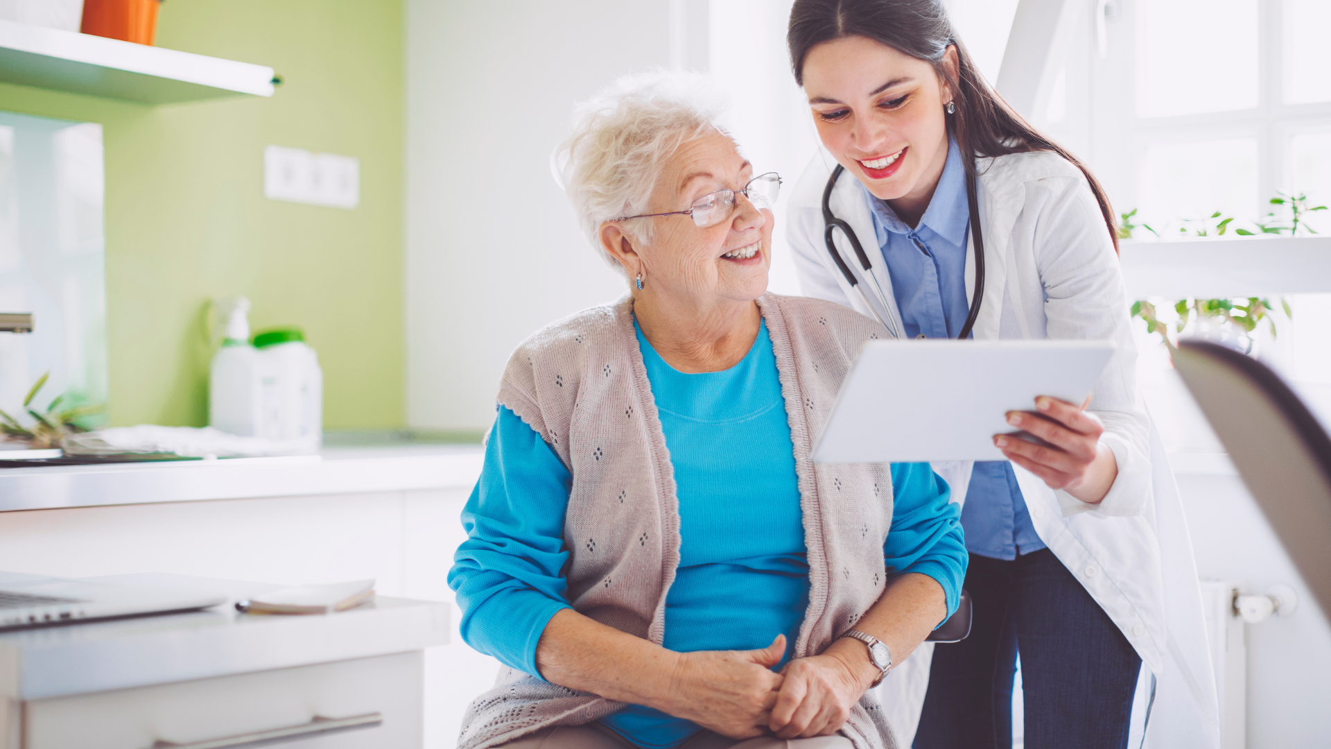 Doctor consulting elderly patient about COPD treatment in a bright and supportive environment.