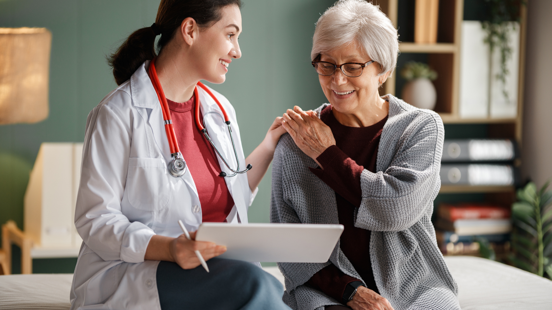 Lung cancer patient being supported during a medical consultation.