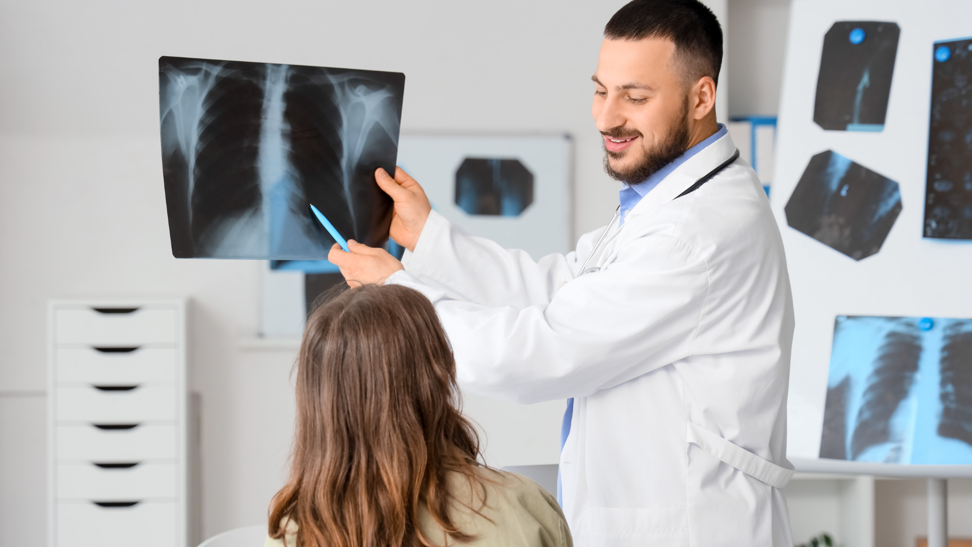 Person smiling while consulting a doctor about lung cancer screening, feeling confident and informed.