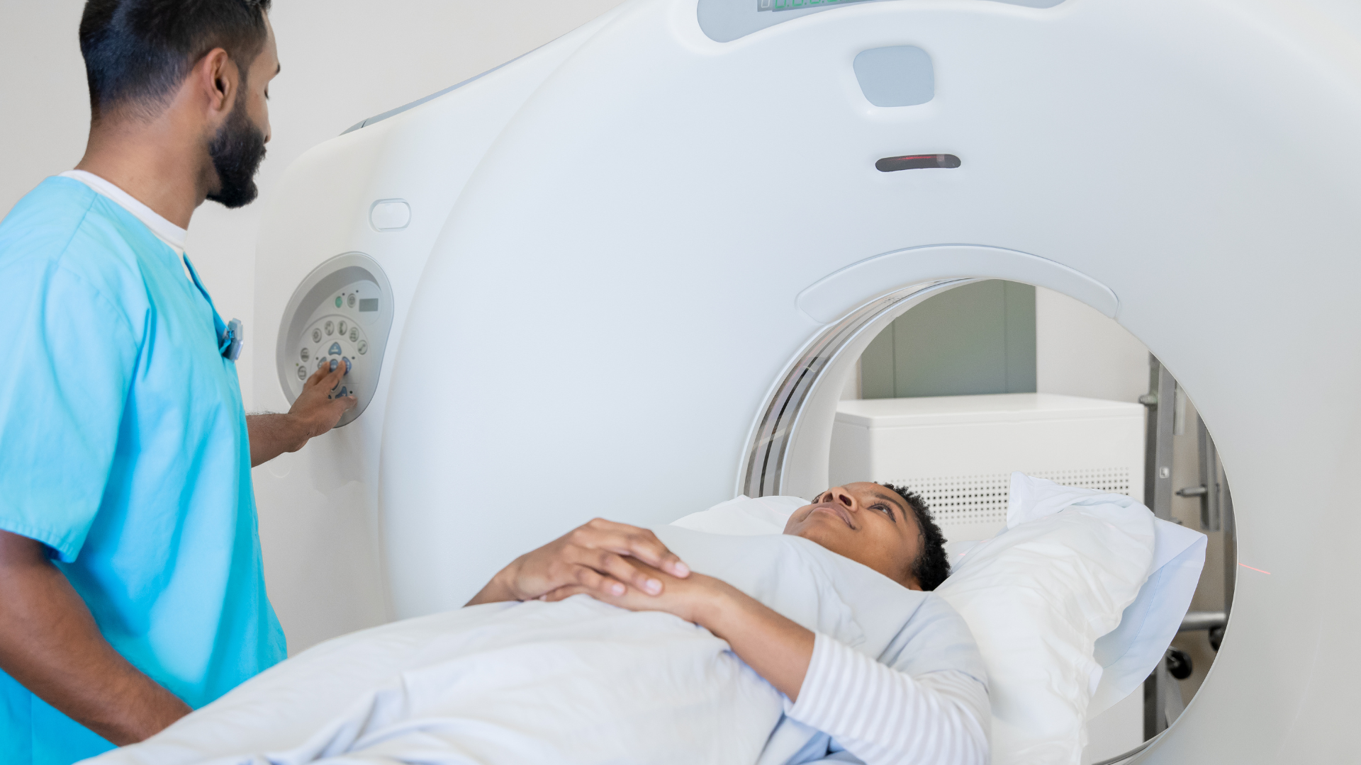 Adult preparing for a low-dose CT scan in a calm medical setting.